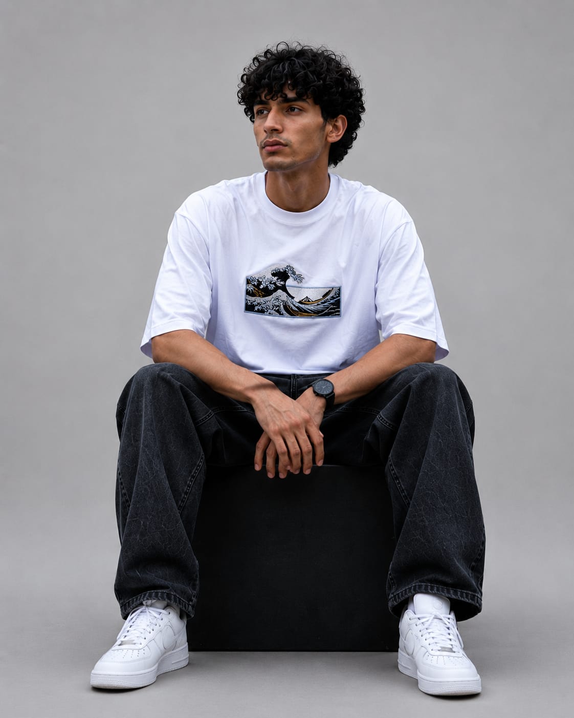 White oversized cotton t-shirt by Wraperers sitting view